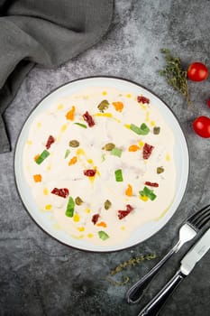 yogurt with additions of syrup, dried fruits and pieces of nuts