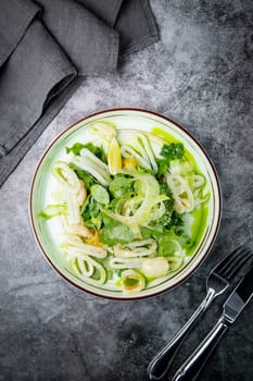 salad with arugula, parsley, lime and squid rings