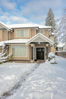 Snow cleared way to the residential house entrance on winter season in British Columbia, Canada