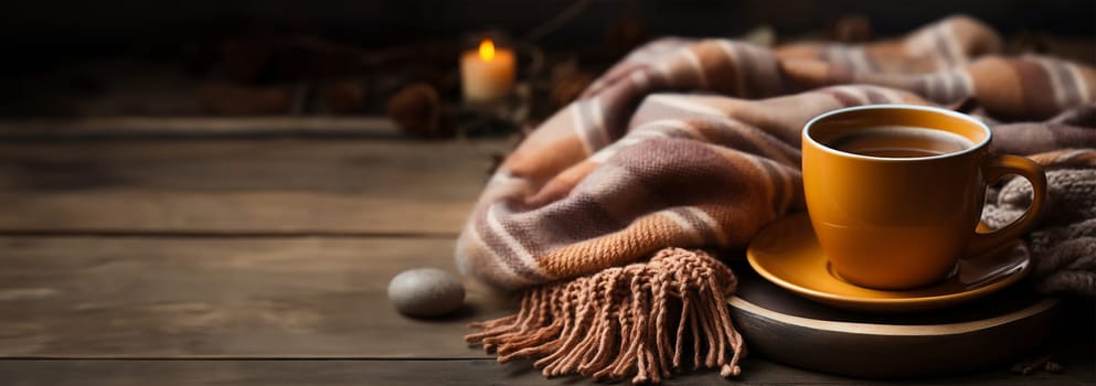 Soft cozy cup of hot tea on natural blanket. Giant, large warm merino wool plaid blanket. Fall or winter time concept. soft knitted drinking tea or other hot drink,coffee copy space Space for text
