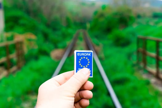 Matches on a rails railroad tracks background, fire on railways concept