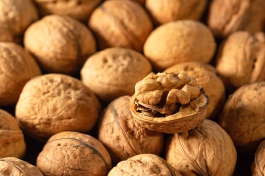 Ripe walnuts on the market close-up. Fresh harvest of nuts. Healthy food concept.