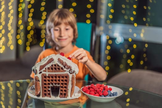 Immerse in festive delight as a boy crafts boy crafting an unconventional gingerbread house, infusing Christmas with unique creativity and festive cheer. A sweet scene of seasonal bonding and culinary fun.