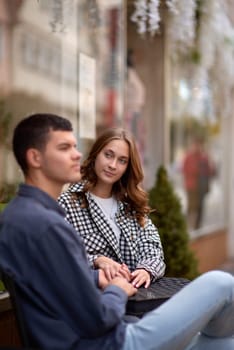 Young Cute Female Hugs Boyfriend. In Autumn Outdoor. Lovers Walking in Park. Attractive Funny Couple. Lovestory in Forest. Man and Woman. Cute Lovers in the Park. Family Concept. Happy Couple.