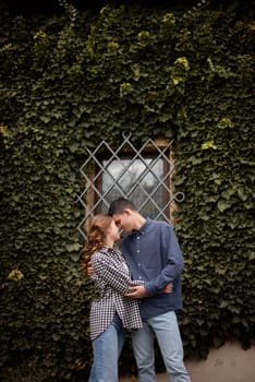 Young Cute Female Hugs Boyfriend. In Autumn Outdoor. Lovers Walking in Park. Attractive Funny Couple. Lovestory in Forest. Man and Woman. Cute Lovers in the Park. Family Concept. Happy Couple.