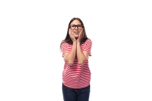 young positive pretty european woman with straight black hair wearing eyeglasses on white background with copy space.