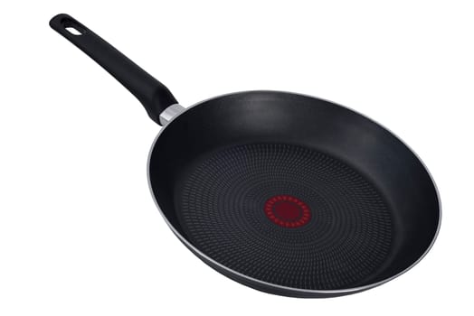 Black frying pan with nonstick surface isolated on white background, close-up.