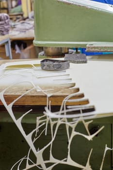 Footwear manufacture. Preparation of insoles, close up