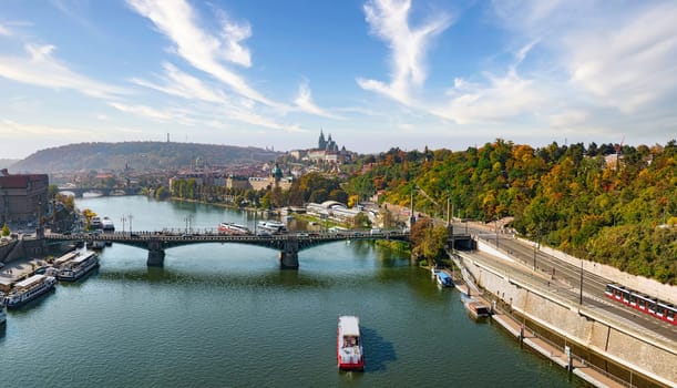 Aerial Prague panoramic drone view of the city of Prague at the Old Town Square, Czechia. Prague Old Town pier architecture and Charles Bridge over Vltava river in Prague at sunset, Czech Republic. 