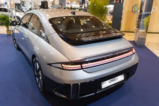 12 MAY 2023, Lisbon, Porugal, Electric car Show in International Fairy of Lisbon - A silver car is on display at a show