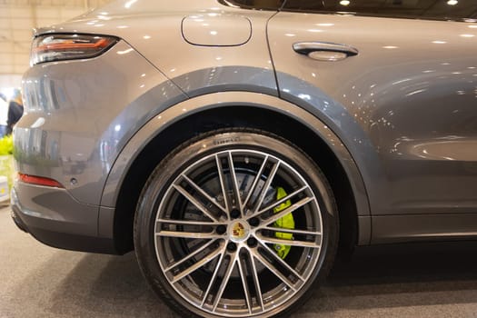 12 MAY 2023, Lisbon, Porugal, Electric car Show in International Fairy of Lisbon - A close up of a car on a showroom floor