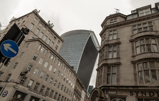 London, UK - Nov 27, 2023 - The 20 Fenchurch Street Walkie Talkie Building in London overshadows surrounding older buildings. Space for text, Selective focus.