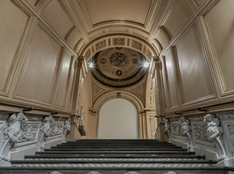 London, UK - Nov 27, 2023 - Architecture design of Round ceiling and Ceramic staircase decoration at The Victoria and Albert Museum. Inner decor, Space for text, Selective focus.