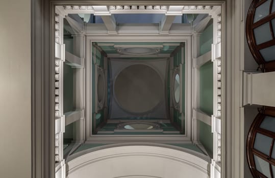 London,UK - Oct 27, 2023 - Look up The high ceiling inside main hall of Victoria and Albert Museum. Ceiling architecture design of Victoria and Albert Museum, Space for text, Selective focus.