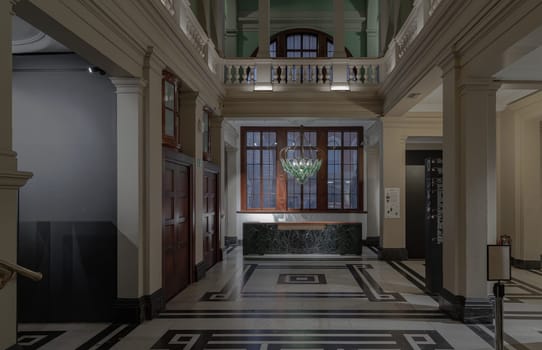 London,UK - Nov 27, 2023 - Beautiful interior architecture design. The room is Vintage dark tone to reveal the primacy of the central structure with ‘Exhale’ the world’s first living bionic chandelier. Space for text, Selective focus.