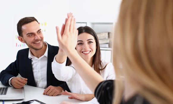 Group of joyful smiling happy people celebrate win with arms up. Mediation offer high five friendship deal achievement strike bargain good news friendly consent successful effective strategy