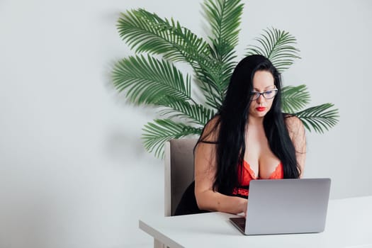 Woman in the office working at the computer Communication Communication Online Work