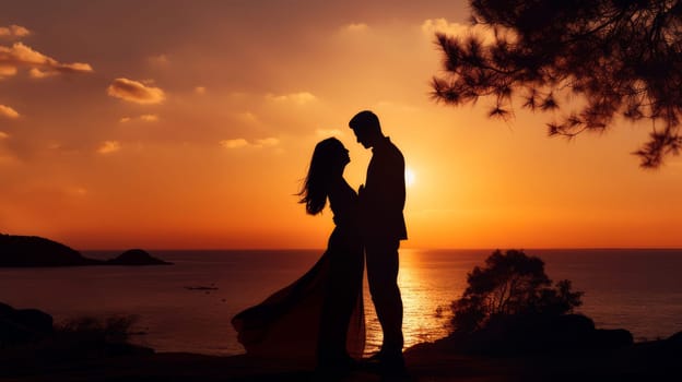 Silhouette of a young couple in love on the background of sunset. Valentine's day, newlyweds, engagement, holiday, birthday, wedding, anniversary, surprise, date.