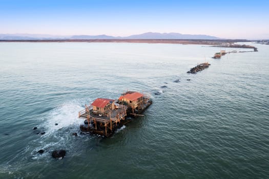 Aerial photographic documentation of the ancient fishing stations at the mouth of the Arno river Tuscany Italy 