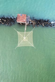 Aerial photographic documentation of the ancient fishing stations at the mouth of the Arno river Tuscany Italy 