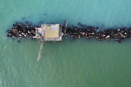 Aerial photographic documentation of the ancient fishing stations at the mouth of the Arno river Tuscany Italy 