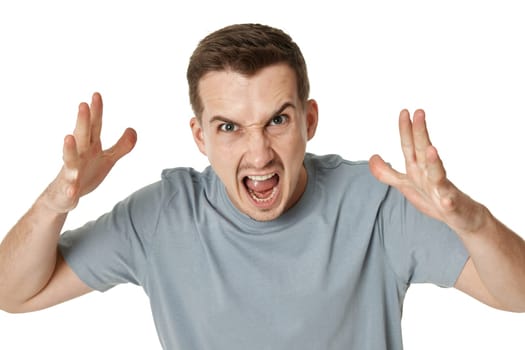 annoyed angry bearded man shouting on white studio background