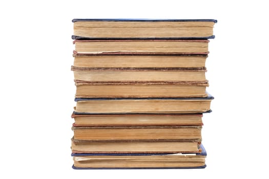 A stack of old books isolated on a white background. Close-up.