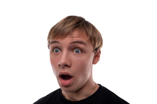 Headshot portrait of a blond Caucasian guy with blond hair, surprised with his mouth wide open.