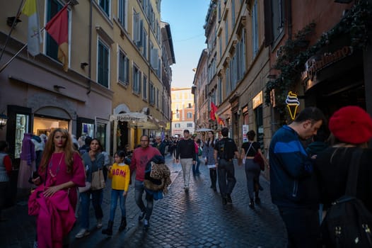 Rome, Italy: 2023 November 14: Tourists walking through the historic center of the city of Rome in Italy in 2023.