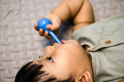 little baby practicing brushing teeth on his own. Kid brushes teeth. Oral hygiene