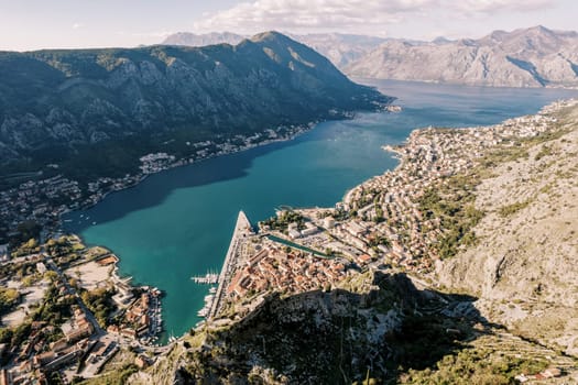 View from the mountain to the bay and the ancient town on the shore. Kotor, Montenegro. High quality photo