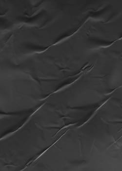 Background texture of crumpled thin black paper