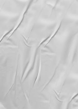 Vertical photo of crumpled gray thin paper