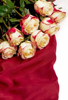 Large bouquet of pink roses on soft silk