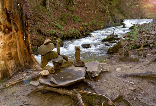 Ukraine. Carpathian. Forest and surroundings of the Shipit waterfall. Cairns