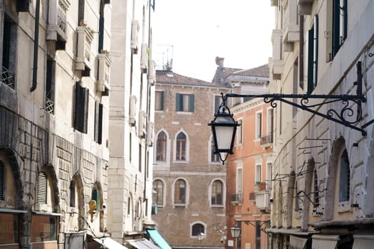 Close-up of a beautiful wrought iron lantern in the old town of the Italian city of Venice.