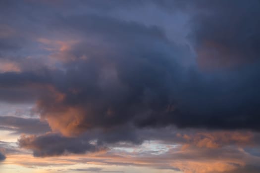 Low angle view to evening sky with dramatic clouds