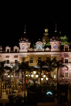 Monaco, Monte-Carlo, 12 November 2022: The Indian wedding celebration in the square of the famous Casino Monte-Carlo is at night, attraction night illumination. High quality photo