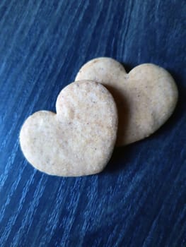 Festive shortbread in the shape of a heart close-up.