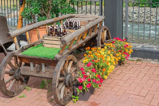 cart with crates of beer at the fair close-up. photo