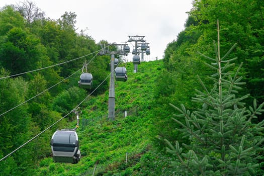 lifts of the mountain cable car on the background of mountains. photo