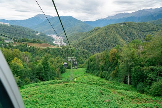 lifts of the mountain cable car on the background of mountains. photo