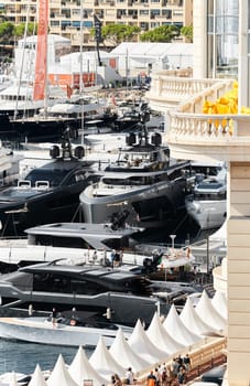 Monaco, Monte Carlo, 27 September 2022 - a lot of luxury yachts at the famous motorboat exhibition in the principality, the most expensive boats for the richest people around the world, yacht brokers. High quality photo