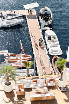 Monaco, Monte Carlo, 27 September 2022 - a lot of luxury yachts at the famous motorboat exhibition in the principality, the most expensive boats for the richest people around the world, yacht brokers. High quality photo