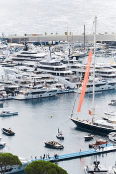 Monaco, Monte Carlo, 27 September 2022 - a lot of luxury yachts at the famous motorboat exhibition in the principality, the most expensive boats for the richest people around the world, yacht brokers. High quality photo