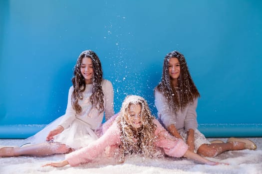 Three beautiful girls in winter snow caps