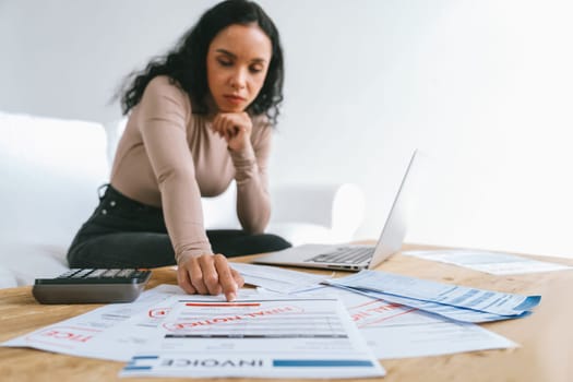 Stressed young woman has financial problems with credit card debt to pay crucial show concept of bad personal money and mortgage pay management crisis. sad and unhappy