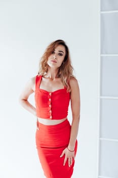 Portrait of a beautiful woman in a red dress
