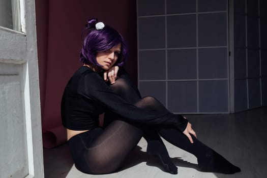 Woman anime cosplayer with purple hair Japan