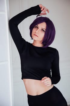 Woman anime cosplayer with purple hair Japan